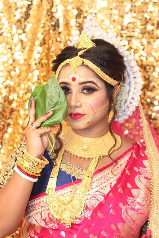 Bengali bridal beauty with paan leaf