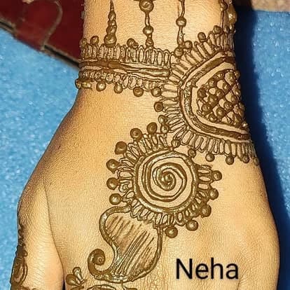 Rose and wrist jewellery mehndi