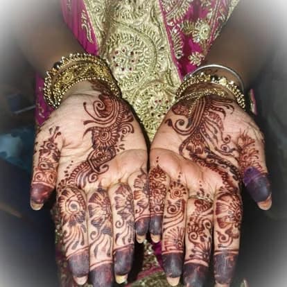 Warm henna stain and floral palms