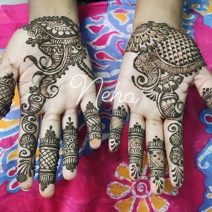 Paisley palms and patterned fingers